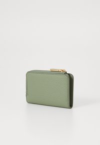 Green leather wallet with a textured finish, rectangular shape, zip closure, and gold-tone hardware. Compact and slim design.