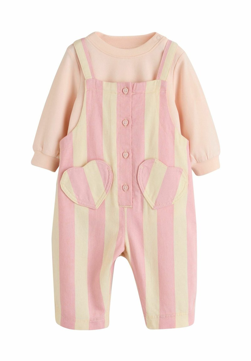 Pink and yellow striped overalls with a peach long-sleeve top. Features heart-shaped pockets and front button closure. Cotton material.