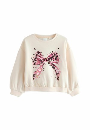 Crewneck-Pullover aus hellpinkem Stoff, verziert mit einem großen Pailletten-Schleifen-Design in verschiedenen Pink- und Schwarztönen, mit puffierten Ärmeln.