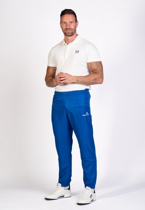 CARSON - Tracksuit bottoms - surf the web white