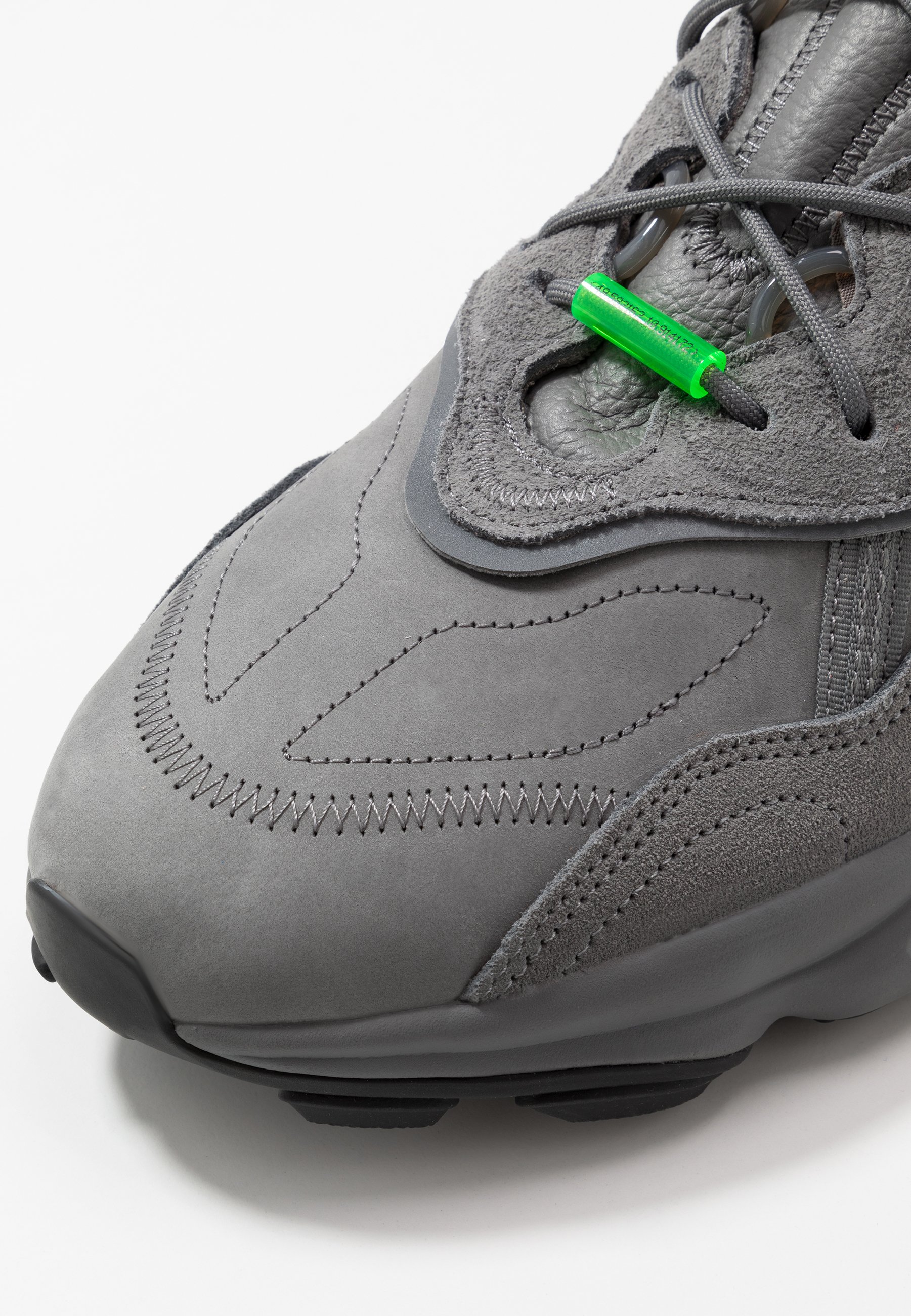 ozweego carbon solar green