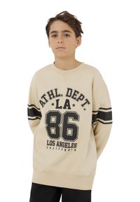 Felpa beige con testo nero "ATHL. DEPT. LA 86" e strisce sulle maniche; presenta una vestibilità rilassata e colletto a costine.