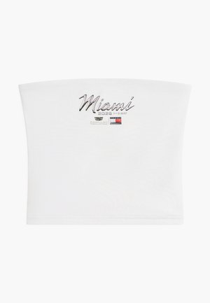 Hvit tube-topp med teksten "Miami 2026 1-3 mai", Cadillac Formula Team-logo og et lite rødt, hvitt og svart flaggemblem på fronten midt på.