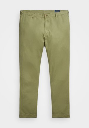 Chinos en coton vert olive avec une coupe droite, fermeture éclair et un seul bouton à l'avant. Texture légère et design simple.