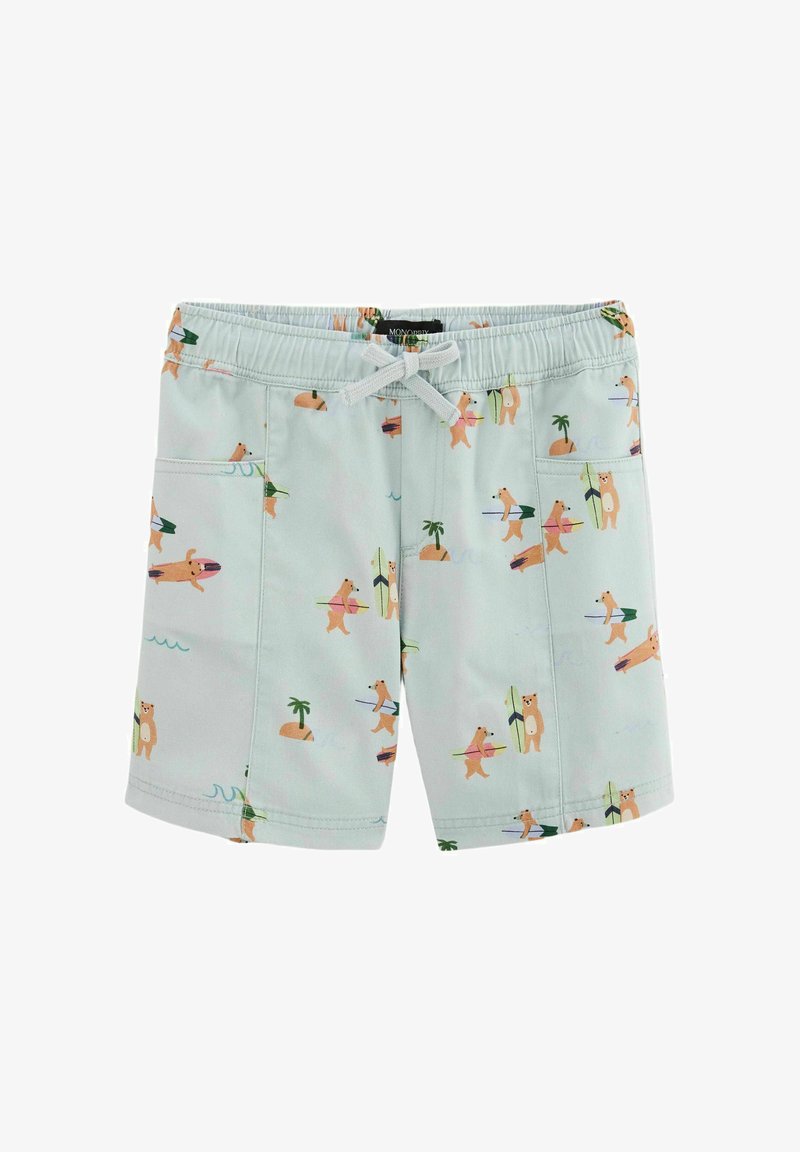 Shorts de bain vert clair avec un imprimé ours et planche de surf, dotés d'une taille élastique, d'un cordon de serrage et de deux poches latérales.