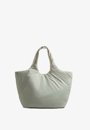 Lichtgroene, gevoerde draagtas met een brede opening en dubbele handvaten. Binnenvoering in contrasterend beige, gladde textuur.