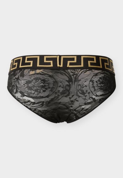 Μαύροι διαφανείς δαντελένιοι σλιπ με λουλουδένια σχέδια και μαύρη ελαστική μέση με χρυσό σχέδιο Ελληνικού κλειδιού.