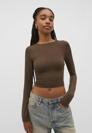 - Bluzka z długim rękawem