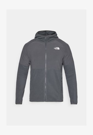 Gray fleece jacket with a zippered front, hood, and contrasting textured panels. Features The North Face logo on the upper left side.
