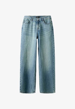 Svetlomodré rifle s širokými nohavicami vyrobené z denimu. Obsahujú päť vreciek, predný zips a zapínanie na gombík. Vyblečané časti na nohách.