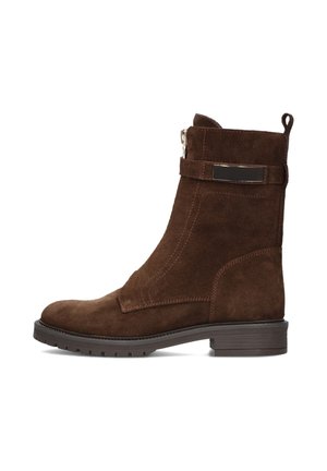 Brown suede ankle boot with a round toe, side zipper, and decorative strap featuring a silver accent. Low, textured rubber sole.