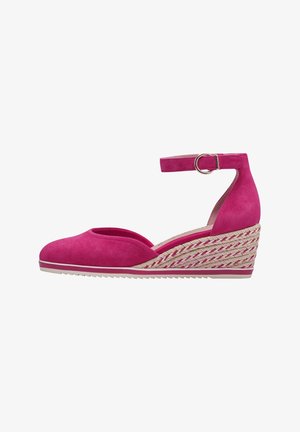 Pink suede wedge shoe with an ankle strap, open toe, and textured braided rope detailing on the heel. Flat rubber sole for grip.