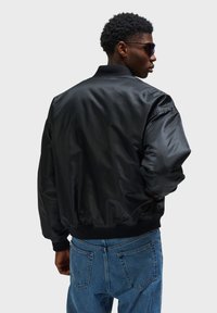 Hummel UNISEX - Bomberjacka - black