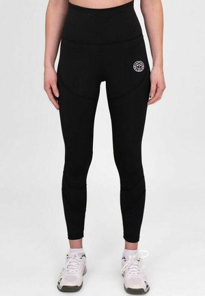 Leggings negros de cintura alta con una textura suave, que presentan un logo en el muslo y un diseño ajustado con acentos de costura curva.