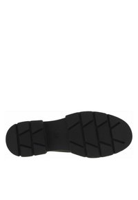 Semelle de chaussure en caoutchouc noir présentant un motif de semelle texturé, avec des nervures et des rainures pour une meilleure adhérence. Marquée de la taille "38" sur la surface.