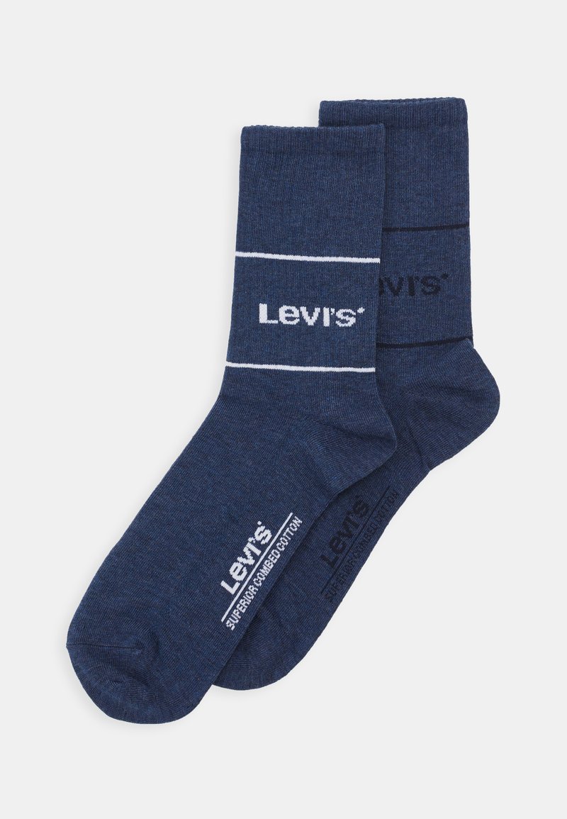 Tamsiai mėlyni medvilniniai komandos kojinės su baltu Levi's logotipu ir horizontaliais dryžiais. Minkšta tekstūra ir gofruoti kraštai užtikrina tvirtą prigludimą.