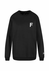 Mustra musta puuvillane särk pikad varrukad, ümar kaelus ja valge "F" logo rinnal. Pehme tekstuur ning soonikkoes varrukaotsad ja alumine äär.
