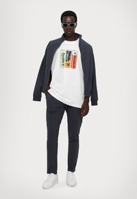 Ron Dorff CITY PANTS - Tepláky - lava grey