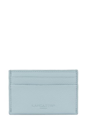 Light blue leather cardholder with smooth texture, featuring four card slots and embossed brand name, Lancaster Paris, on the front.