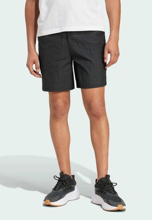 CITY ESCAPE WOVEN - Shorts - black
