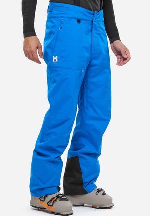 Blaue Skihosen aus wasserabweisendem Material, mit Reißverschlusstaschen, einem Logo am Oberschenkel und einem schwarzen Akzent an den Bündchen.