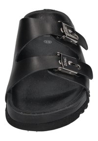 Black sandals with two buckle straps, made from textured material, featuring a flat sole and a molded footbed for comfort. Size 39 visible.