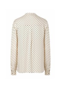 Lange mouwen shirt in crèmekleurige stof, met een zwart stippenpatroon, kraag en knoopmanchetten; achterkant met plooidetail.