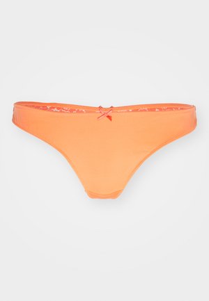 Oranger Bikini-Unterteil aus weichem Stoff, mit niedrigem Schnitt, dünnen Trägern und einem kleinen Schleifendetail auf der Rückseite.