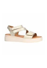 Metallic gold sandals with a crocodile pattern, two adjustable straps, and a cream platform sole featuring a textured bottom.