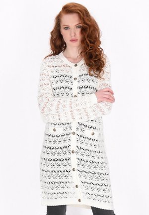 Witte gebreide cardigan met kantpatroon, met een knoopsluiting aan de voorkant, ronde halslijn, lange mouwen en twee voorzakken.