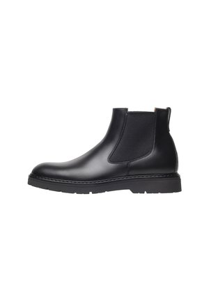 Stivale Chelsea in pelle nera con pannelli laterali elasticizzati, punta tondeggiante, suola in gomma resistente e cuciture a contrasto lungo il perimetro.