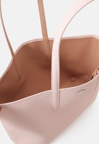 Lacoste 3-IN-1 - Saco de mão - chair amande