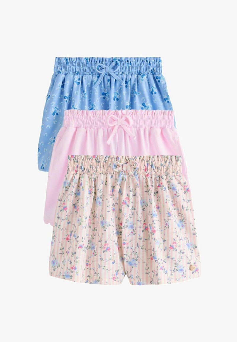 Tre paia di pantaloncini con vita elasticizzata e fiocchi, con motivi a fiori blu, rosa tinta unita e strisce floreali rosa.