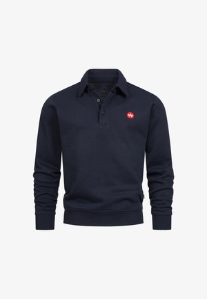 Marineblauwe poloshirt met lange mouwen van katoen. Beschikt over een kraag, een voorflap met knopen en een klein rood logo op de borst.
