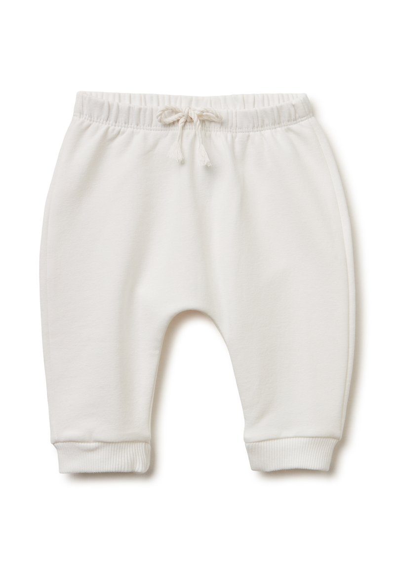 Pantalones de chándal blancos de algodón con cintura elástica y cordón. Puños acanalados en los tobillos. Textura suave y lisa. Sin patrones ni acentos.