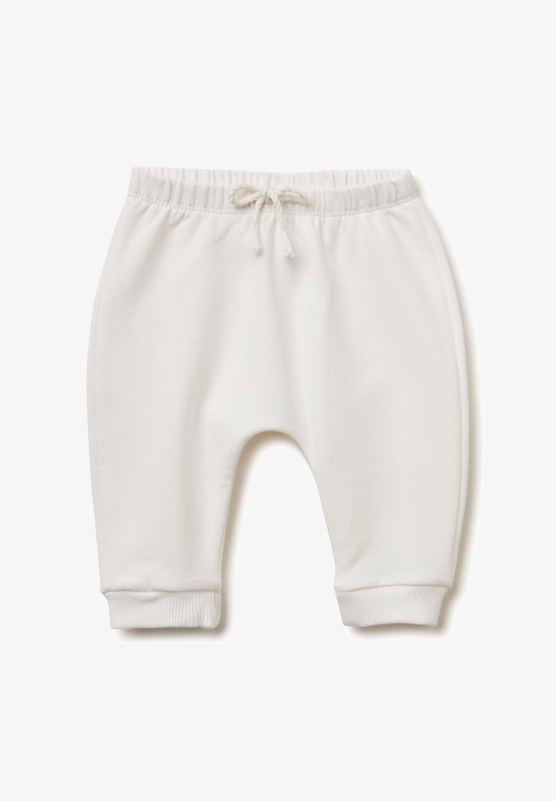 Pantalones de chándal blancos de algodón con cintura elástica y cordón. Puños acanalados en los tobillos. Textura suave y lisa. Sin patrones ni acentos.