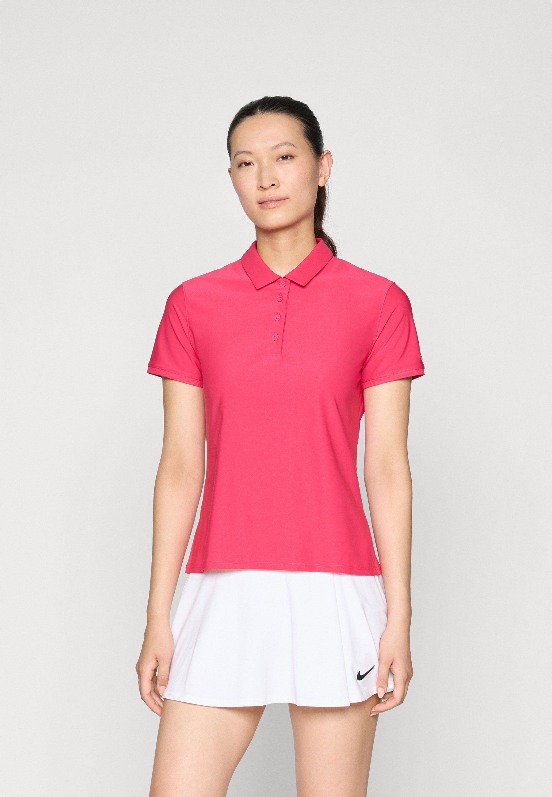 pink nike golf polo