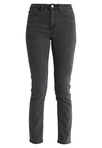 Jeans de mezclilla negra de talle alto con un ajuste slim, que cuentan con cinco bolsillos y cierre de botón plateado. Tejido texturizado con un leve desvanecimiento.