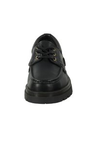 Black leather shoe featuring a rounded toe, thick rubber sole, gold eyelets, and laces. Smooth texture with stitched detailing.