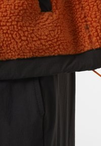 Helly Hansen PILE pomarańczowy