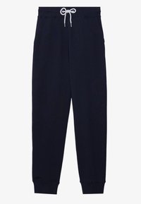 Marineblauwe sweatpants van zachte katoen met een elastische tailleband, witte trekkoord en taps toelopende boorden. Beschikt over twee zijzakken.