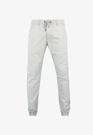 Hellgraue legere Jogginghosen mit elastischem Bund, Kordelzug, Seitentaschen und elastischen Bündchen an den Knöcheln.