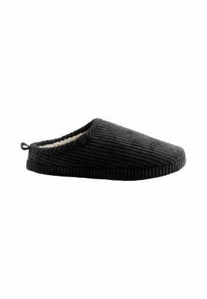 Black corduroy slipper with a textured surface, soft lining, and a loop tab at the heel for easy wear. Features a minimalistic design.
