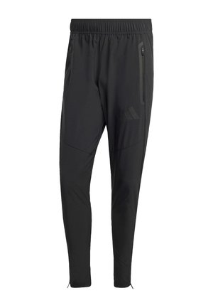 Schwarze Sporthose mit elastischem Bund, seitlichen Reißverschlusstaschen, schmaler Passform und strukturiertem Muster an den Seiten.