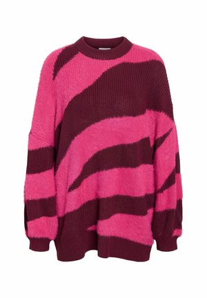 Maglione oversize a manica lunga con scollatura rotonda. Presenta audaci righe ondulate in rosa e bordeaux. Texture morbida con polsini e orlo a costine.