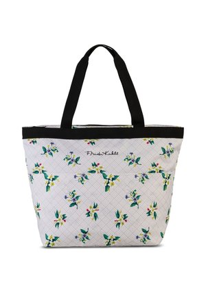 Tote bag with a white background featuring a floral pattern in green, yellow, and purple; black handles and trim; rectangular shape.