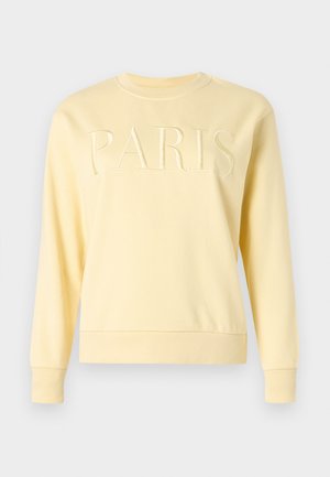 Svetlo žltá mikina s okrúhlym výstrihom, dlhými rukávmi a vyšívaným nápisom "PARIS" na hrudi.