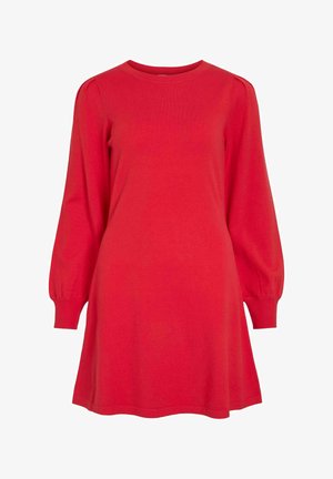 Abito a maglia rosso con scollo tondo, maniche lunghe a sbuffo e forma svasata a A per un fitting rilassato. Tessuto morbido, dettagli minimi.