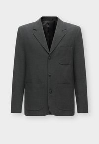 Blazer grigio scuro realizzato in tessuto testurizzato, con una tasca sul petto, rever a punta e tre bottoni sul davanti. Fodera interna.