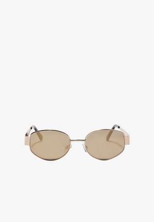 Occhiali da sole ovali di colore marrone con una sottile montatura in metallo. Le aste presentano un accento beige chiaro vicino alle cerniere. Inclusi cuscinetti trasparenti per il naso.